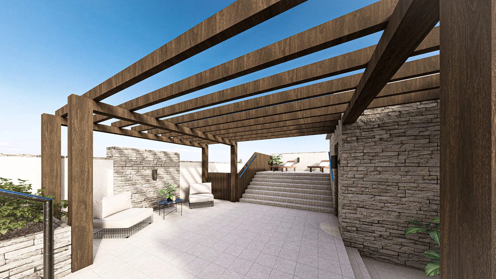 Rooftop pergola seating area with natural stone walls at Ocean Crest